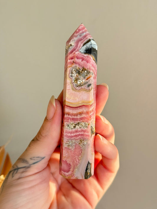 Rhodochrosite with Pyrite Point